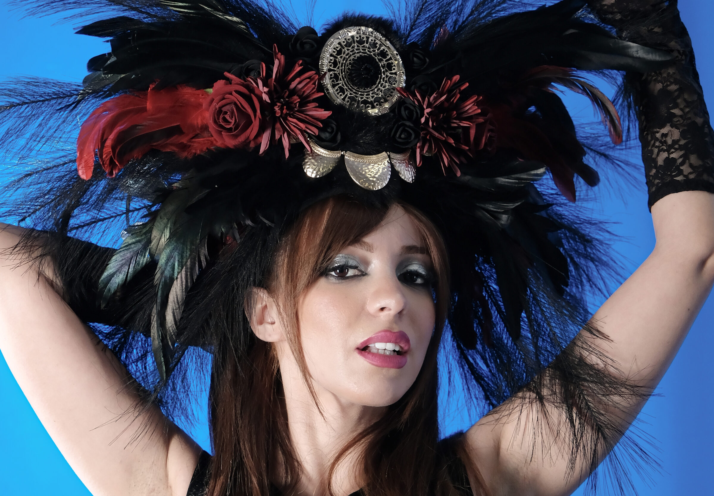 Feathered headpiece by Cathy Neale